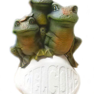 Grodor på välkomststen