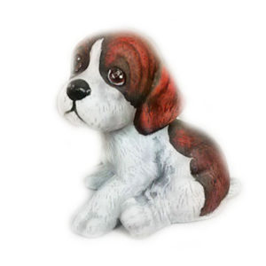 Liten sittande hund